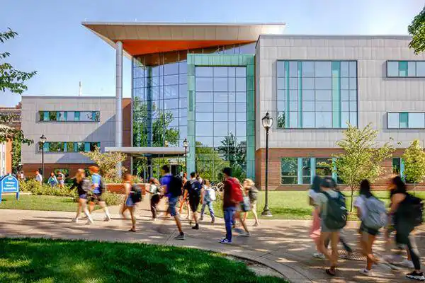 Students walk past the Interdisciplinary Science and Engineering Building